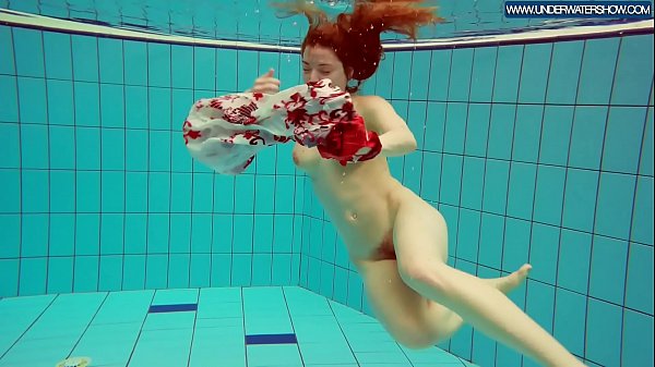Hot Polish redhead swimming in_the pool