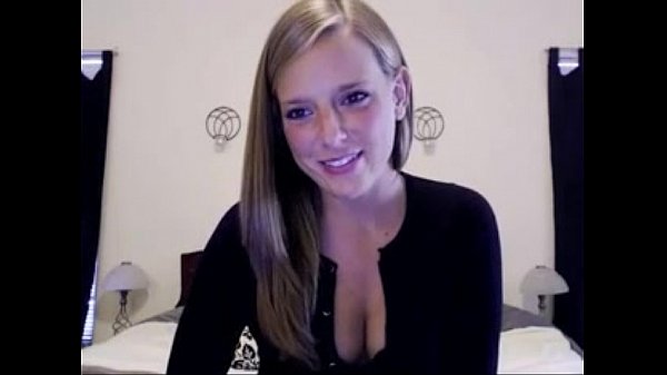 white american girl smiles and shows cleavage at_home