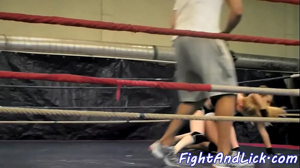 European lesbians wrestling in a boxing ring 