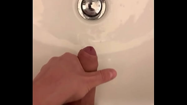Man jerking in sink full with cum wet
