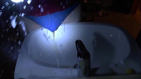 peeingblue underpantsover sink
