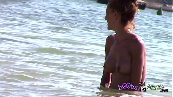 Play MP4 - Nice skinny MILF with nice big fake tits in the sea