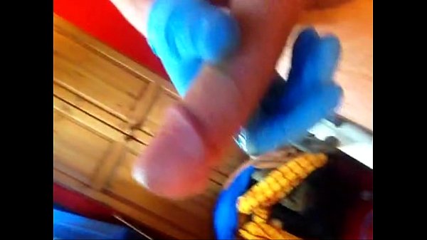 Play MP4 - Rubber glove fucks huge cock and cums