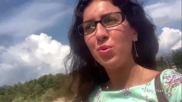 Babe with glasses walks in public and shows_tits and_pussy