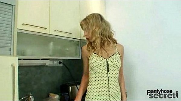 Blonde vanesa masturbates through her blue nylons in kitchen