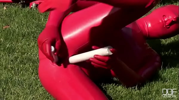 Busty babe toying in full latexwear