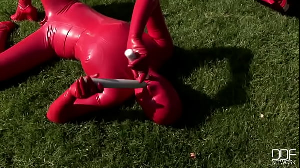 Busty babe toying in full latexwear 