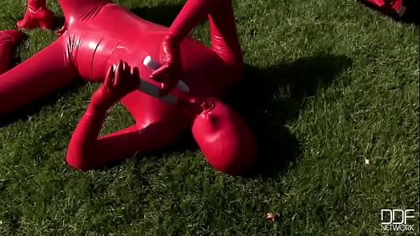 Busty babe toying in full latexwear