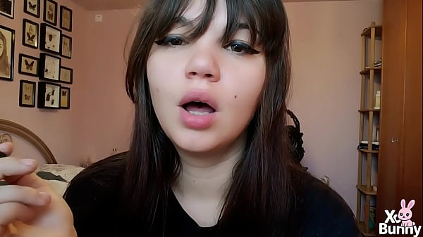Brunette with natural big lips smoking without lip makeup 