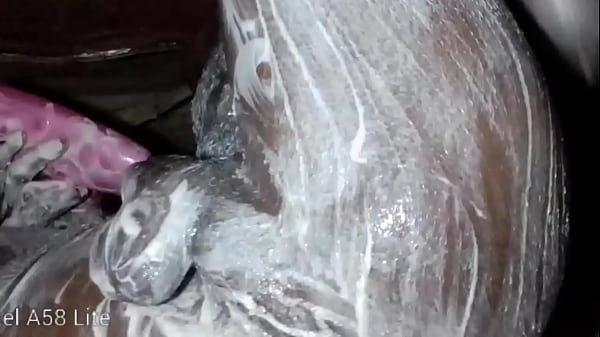 African lonely man pours body lotion on this cock and ass 