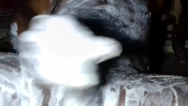 African lonely man pours body lotion on this cock and ass 