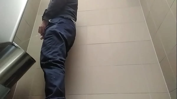 Play MP4 - Young guy peeing with his uncut cock in a highway toilet