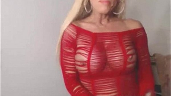 Busty milf in red lingerie toying cunt 