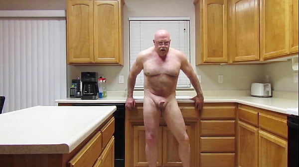 Naked putting the_dishes away