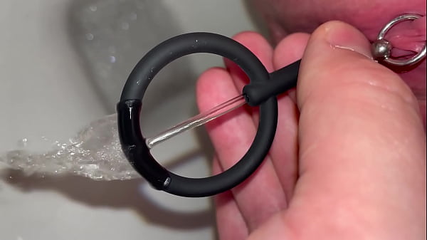 Using dilator for clit pissing