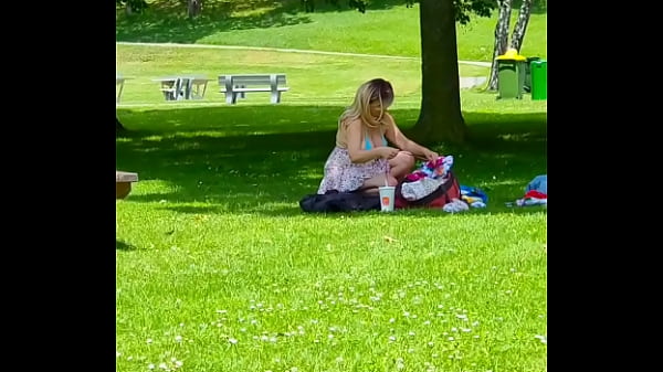 In public exhibitionist milf caught on cam huge tits in a microkini