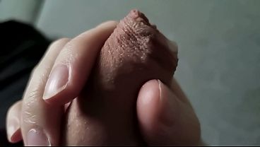 Closeup jerking of an uncut Swedish cock in slowmotion