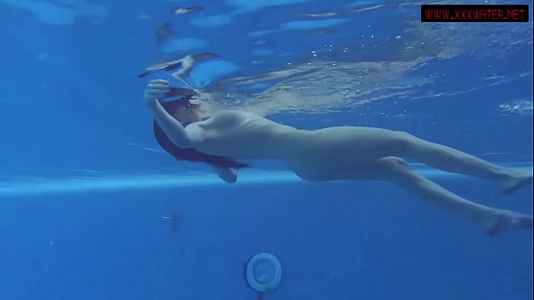 Brunette big tits babe Mia Ferrari swims in_the pool