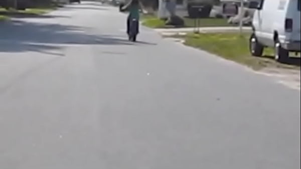 Girl revving a dirtbike 