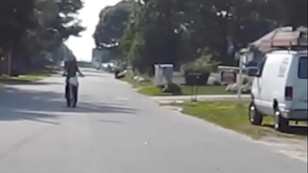 Girl revving a dirtbike 