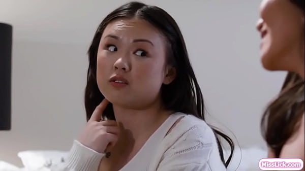 Lulu Chu takes the previous house owner Jennie Rose to the bedroom to chat.They start flirting and kissing.Jennie sucks her tits and licks her pussy 