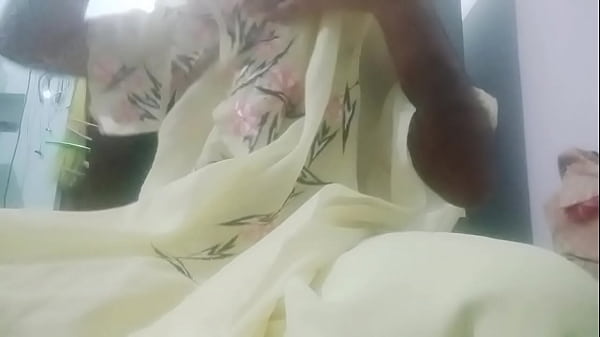 Indian Gay Crossdresser Gaurisissy feeling horny in yellow saree just like a housewife 