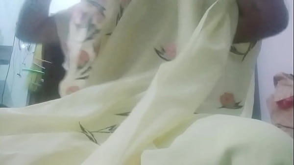 Indian Gay Crossdresser Gaurisissy feeling horny in yellow saree just like a housewife