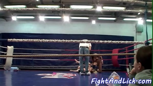 Athletic_lesbians wrestling in a boxing ring