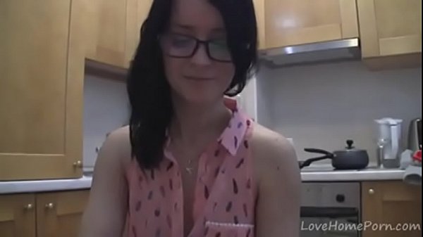 splendid teen with glasses chatting in the kitchen