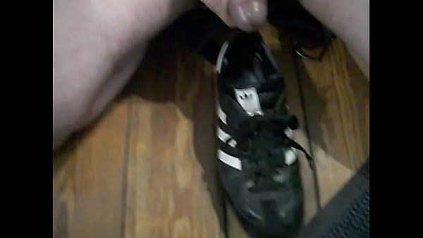 Shooting a load in my old Adidas Sneakers 