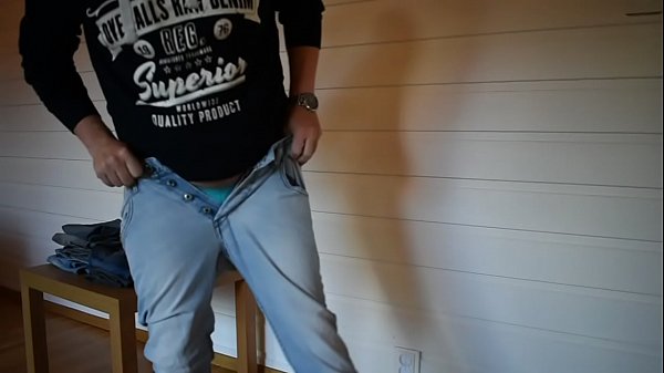 Trying on tight jeans 