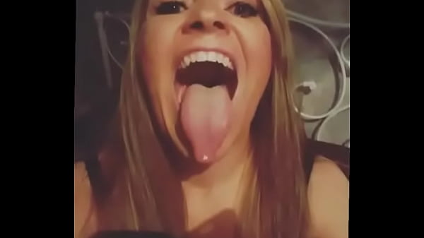Horny milf shows long tongue and throat