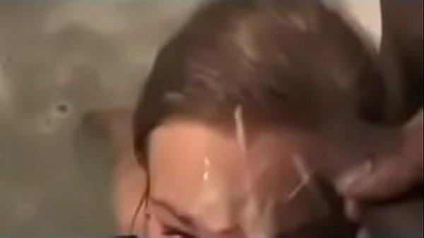 Blonde in the bathtub sucksoff a black cock and gets a hugely messy facial