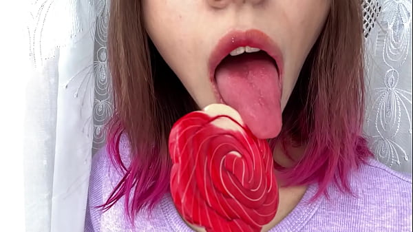 Naughty stepsister sucks a lollipop and show her_long hot sexy tongue