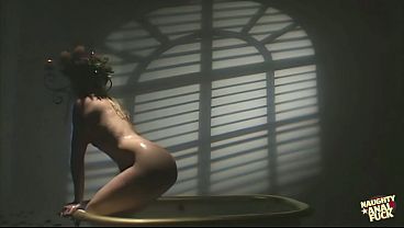 A stunning blonde engages in sexual intercourse in a bathtub with a large penis