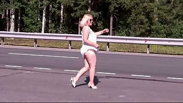 Hot MILF on the road seduces with her ass