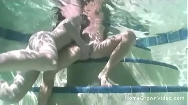 Skinny lesbian fingering and licking her girlfriend in the pool 