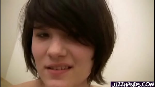 Cute brunette handles cock for fist time