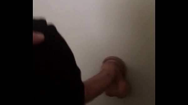 Sucking on her favorite black rubber dildo