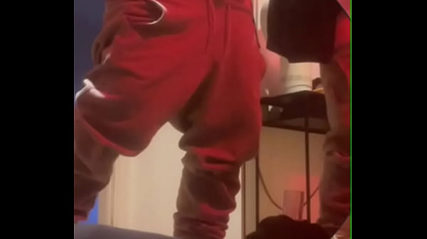 Amateur boy pissing in a glass held in his friend's mouth 