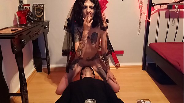 Licking blasphemic whore_while she smokesand rides a crucifix dildo