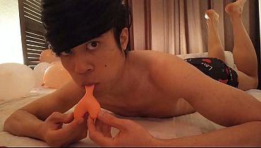 Balloons Fetish For Valentine, This Asian Boy Blows Up Balloon, One Pops, He Smiles And Wiggles thumbnail