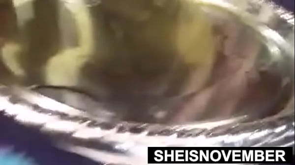 Hot fat black bimbo sheisnovember pissing standing in restroom dripping in oiled grease raunchy naked crotch with large butt squatting and voluptuous exotic boobs with hard nipples out pose closeup erotica by msnovember