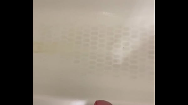 Holding my balls while I piss after drinking