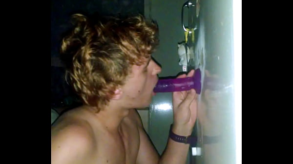 Cute teen sucks dildo