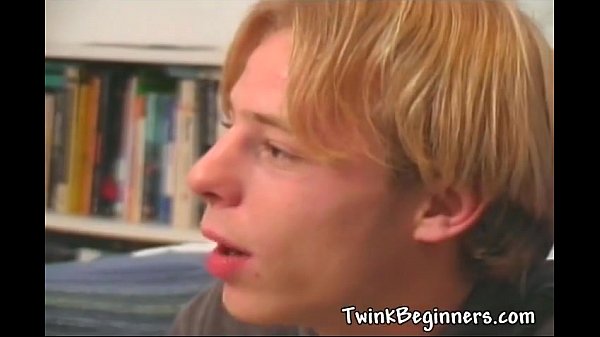 Hot guy stroking his cock on bed