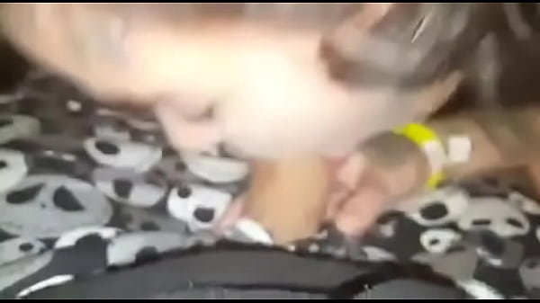 Tattooed girl showing mouth skills 