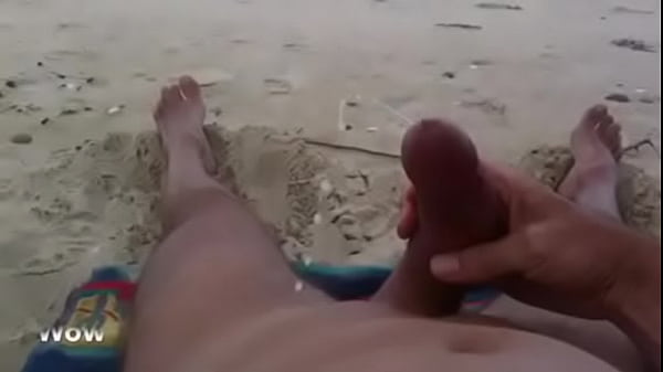Play MP4 - Curved cock wank and cum at nude beach