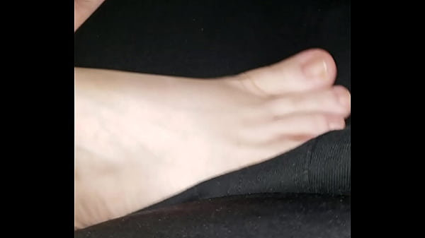 My girlfriend Rubbing my crotch with her feet
