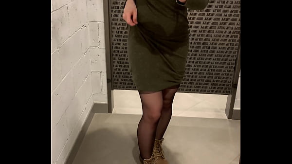 Riding a dildo in the fitting room from a beauty in stockings 
